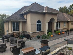 Before image to a home that had expert home stucco repair and painting service