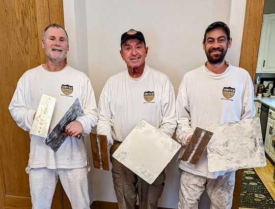 Image of the United Wall Systems restoration team