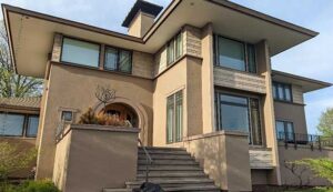 curb view of a home having underwent stucco restore service