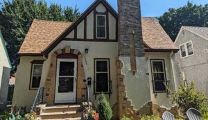 curb view of home that underwent stucco painting service